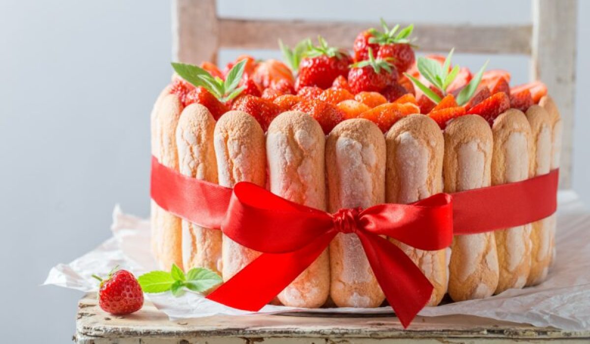 Homemade and delicious cake with jelly and strawberries.