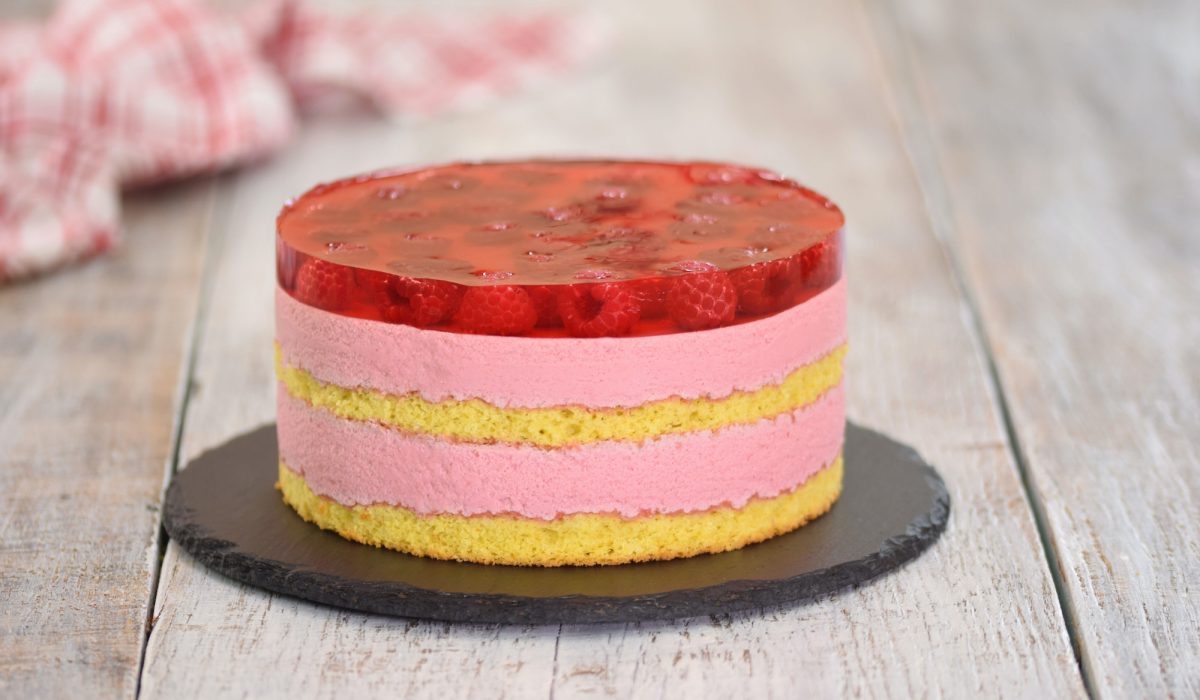 Raspberry mousse cake. Cake with jelly and cream. Cake with raspberries.